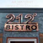 copper sign for 212 BISTRO cut with our waterjet